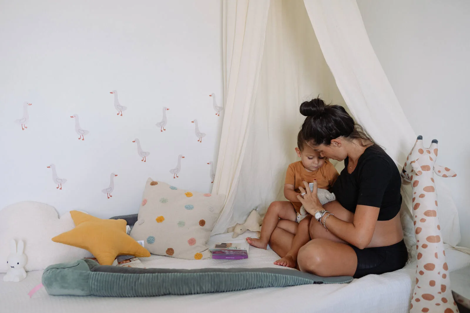 A mom and her child, a peaceful bedtime