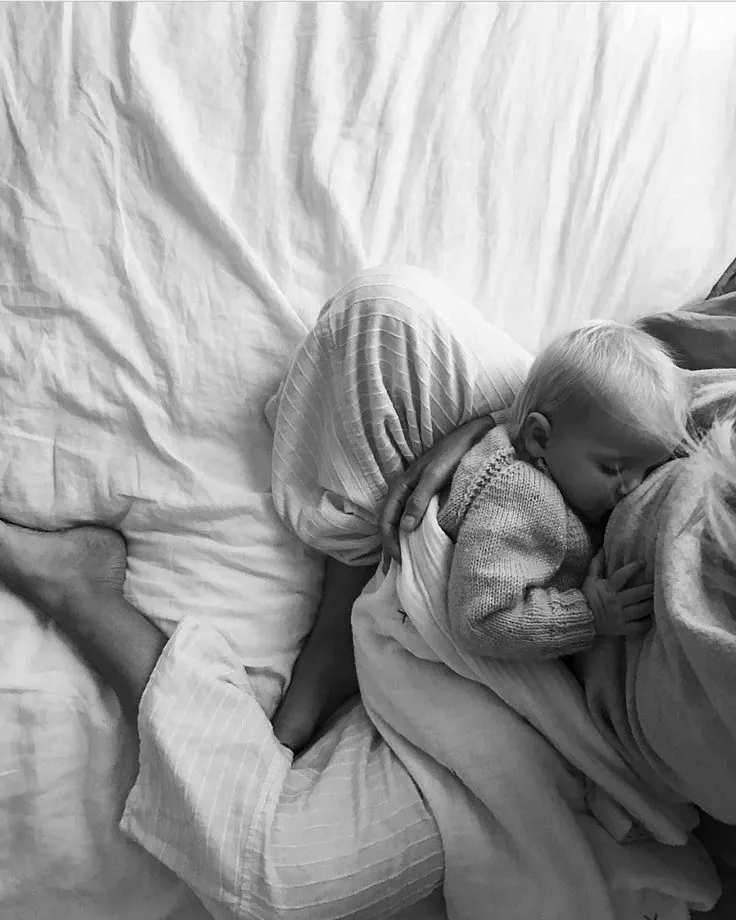 Mum and child resting together, peaceful